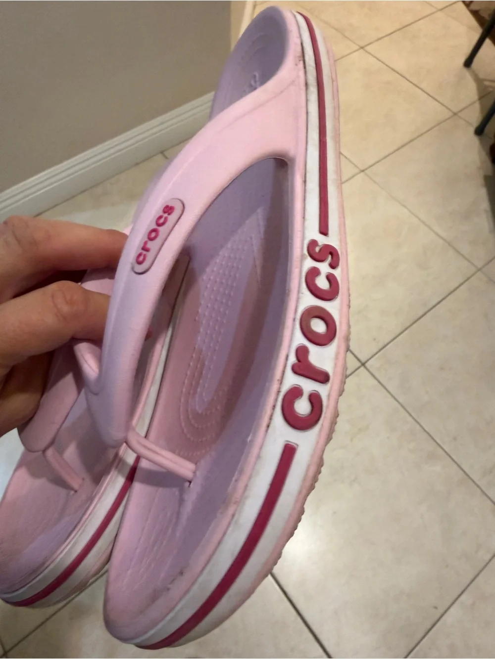 CROCS women’s Light Pink flip flops